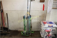 Lot:  2 closet poles, 3 squeegees and parts