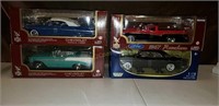 4  Die cast 1:18th scale cars NRFB