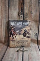 Fantastic Wild West Show Book and a single Spur