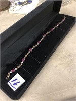Wow!  faceted ruby tennis bracelet