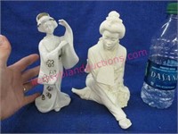 2 geisha figurines
