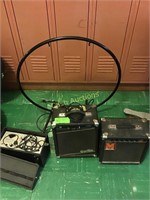 Two guitar amplifiers, Peterson A/V tuner, and
