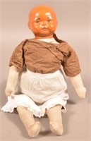 Antique Cloth Body Doll with Molded Redware Head.