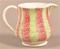 Red and Green Rainbow Spatter Cream Pitcher.