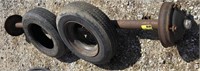 Axle and Good Year tire (2) lot