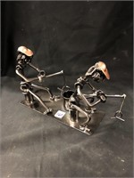 Two fishermen, metal art made out of bolts