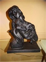 Sculpture of Woman Holding a Child
