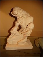 Sculpture of a Mother & 2 Children