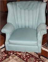 barrel back upholstered chair with ball