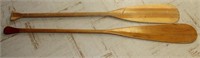 2 wooden canoe paddles, 1 split end