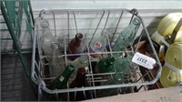 Old pop bottles in wire crate