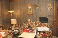 Remaining contents of living room: clocks, antlers