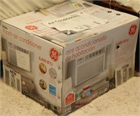 G E air conditioner, 6,400 btu, sealed in OB
