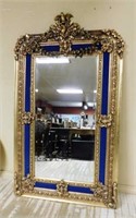 Bird and Floral Swag Crowned Gilt Beveled Mirror.