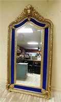 Cartouche and Foliate Crowned Gilt Beveled Mirror.