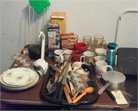 Table lot of kitchen items, plates, A&W mugs, more