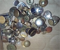 Jar of old metal sewing buttons