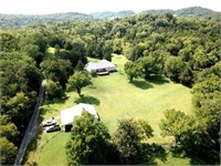 TWO HOMES ON 70+/- ACRES