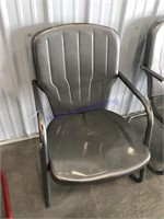Gray metal yard chair