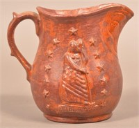 Antique Redware Pitcher with Embossed Lady Liberty