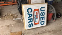 Value rated used car sign