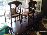 Nice dark pine table w/6chairs woven seats