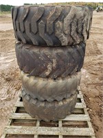 (4) Skid Steer Tires on rims 12-16.5