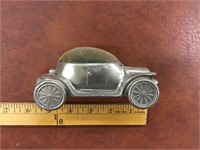 Early Automotive Cast metal pin cushion.