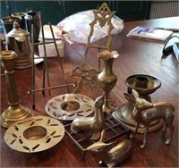 Brass candle sticks,  plate holders and animals