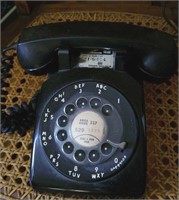 Black desk top dial telephone