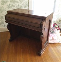 Antique desk made out of a pump organ base,