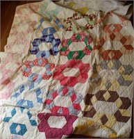 Hand pieced and sewn quilt, stains, wear