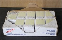 9 Stacks of Yellow Guest Cheques - New