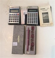PEN AND CALCULATOR GROUP