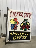 Corner Gifts sign, minor cracks in plastic,