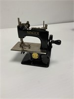 Vintage Toy Singer hand crank sewing machine