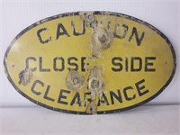 Oval porcelain caution sign