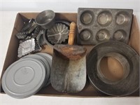 Lot of various tin molds and movie reels