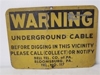 Bell telephone warning sign