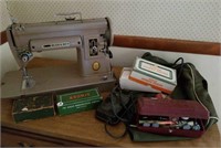 Singer sewing machine model 301a & attachments