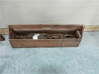 Wooden Tool Box full of railroad spikes and