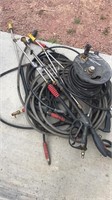 Pressure washer hoses and reel