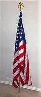 American Flag on Gold Colored Pole