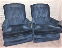 Two Blue Swivel Rocking Chairs