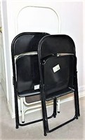Two Black Folding Chairs With Stepstool