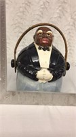 Black Americana cookie jar with whisker handle