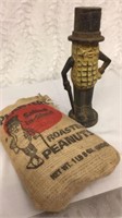 Mr. Peanut cast iron bank and peanuts
