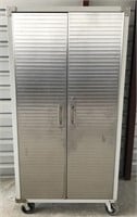 LARGE METAL CABINET W/ SHELVES ON CASTERS