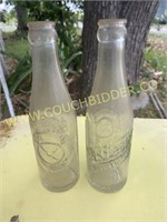 embossed Dr Pepper 10-2-4 soda bottles
