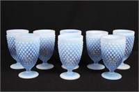 Eight Fenton Blue Opalescent Hobnail Goblets 6" H.